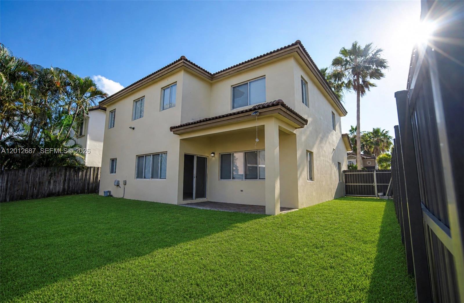 1751 Southwest 154th Path Miami, FL 33185 - Photo 39 of 41 a view of house with a yard and potted plants