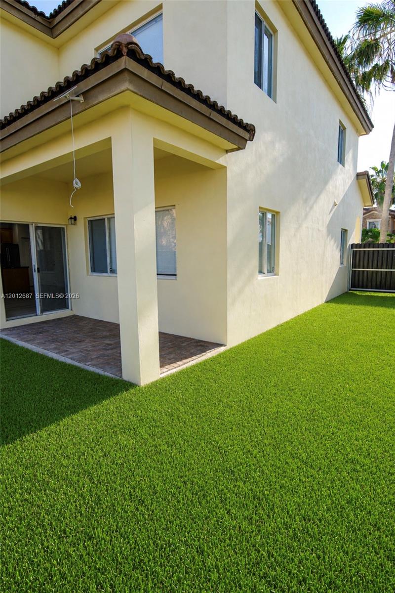 1751 Southwest 154th Path Miami, FL 33185 - Photo 40 of 41 a view of a house with a yard