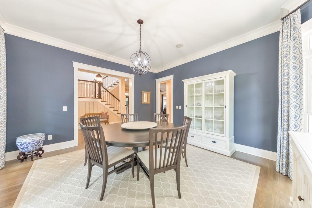 3901 Hazelhurst Drive Northeast Marietta, GA 30066 - Photo 14 of 79 a view of a dining room with furniture window and wooden floor