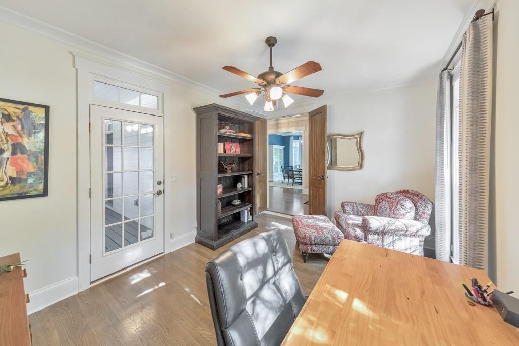 3901 Hazelhurst Drive Northeast Marietta, GA 30066 - Photo 17 of 79 a bedroom with a bed and a chandelier