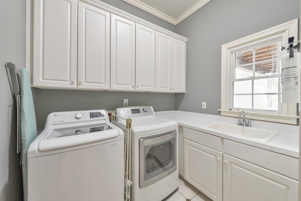 3901 Hazelhurst Drive Northeast Marietta, GA 30066 - Photo 26 of 79 a utility room with dryer and washer