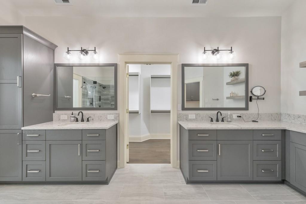 3901 Hazelhurst Drive Northeast Marietta, GA 30066 - Photo 33 of 79 a bathroom with a granite countertop double vanity sink mirror and bathtub