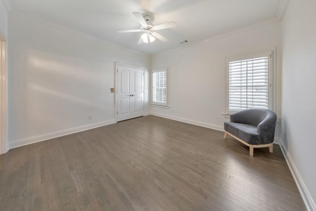 3901 Hazelhurst Drive Northeast Marietta, GA 30066 - Photo 39 of 79 an empty room with wooden floor and windows
