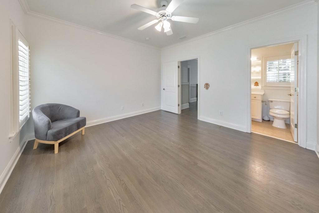 3901 Hazelhurst Drive Northeast Marietta, GA 30066 - Photo 40 of 79 a view of an empty room with a window and wooden floor