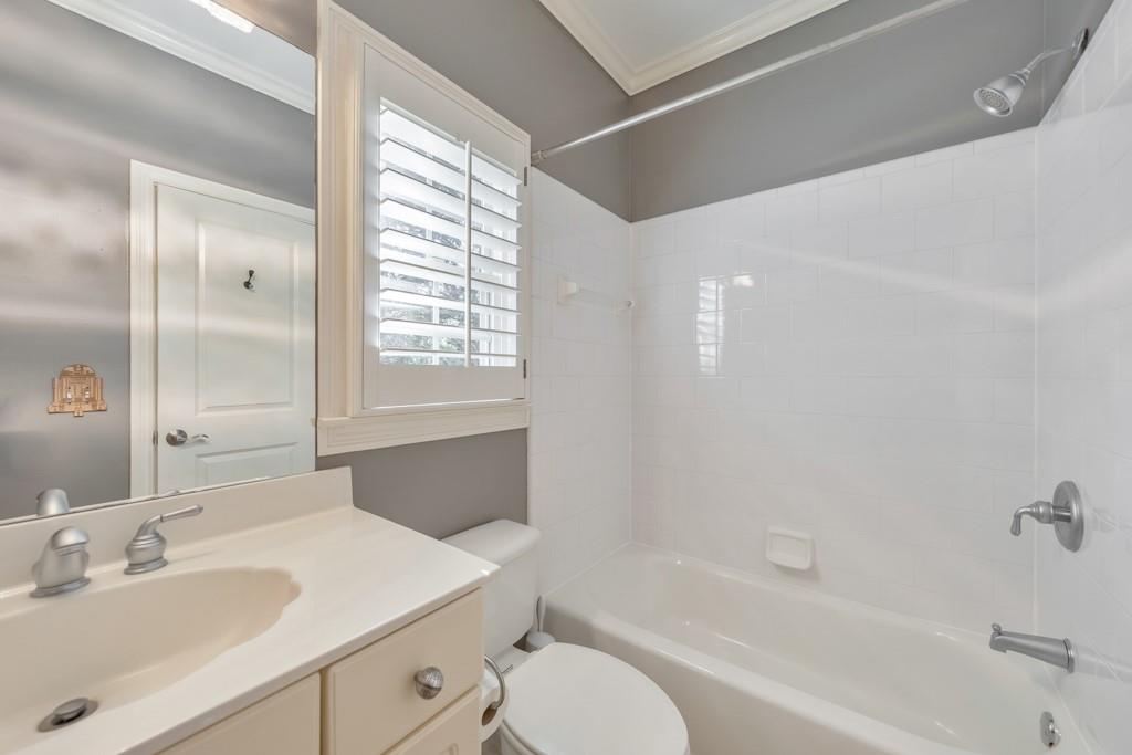 3901 Hazelhurst Drive Northeast Marietta, GA 30066 - Photo 41 of 79 a bathroom with a bathtub shower sink vanity and a toilet
