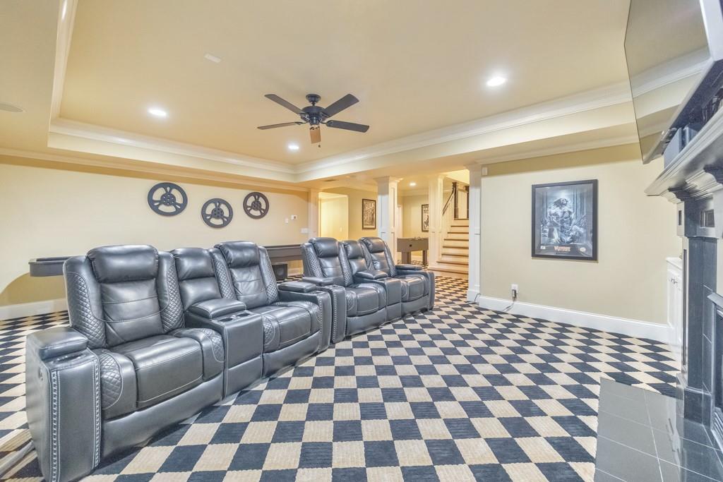 3901 Hazelhurst Drive Northeast Marietta, GA 30066 - Photo 44 of 79 a spacious bedroom with a bed and a couch