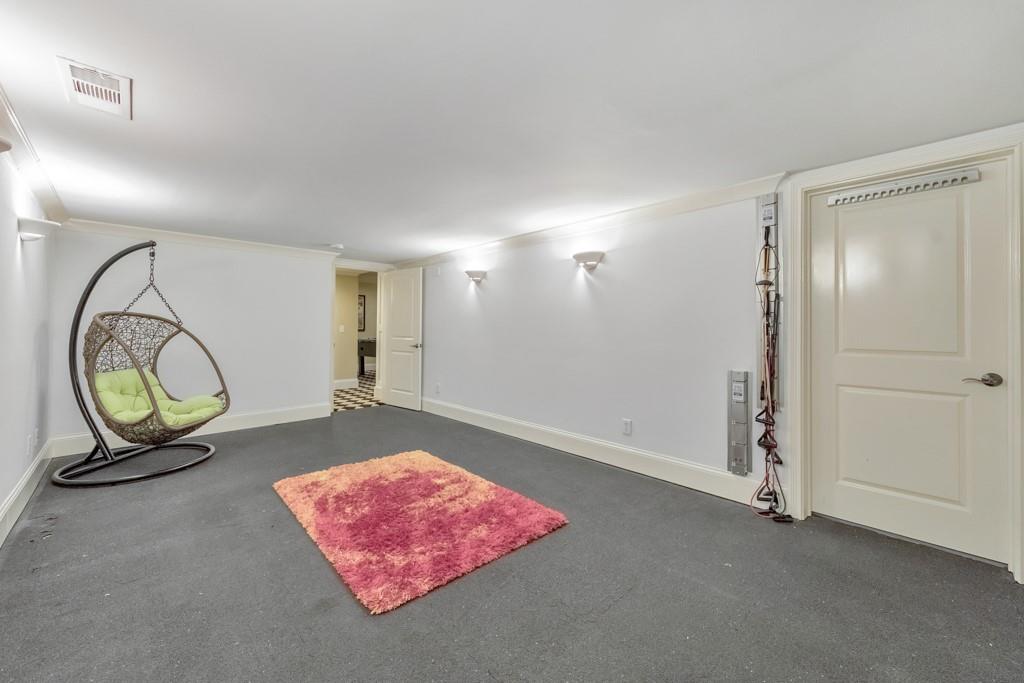 3901 Hazelhurst Drive Northeast Marietta, GA 30066 - Photo 46 of 79 a view of a room with wooden floor and window
