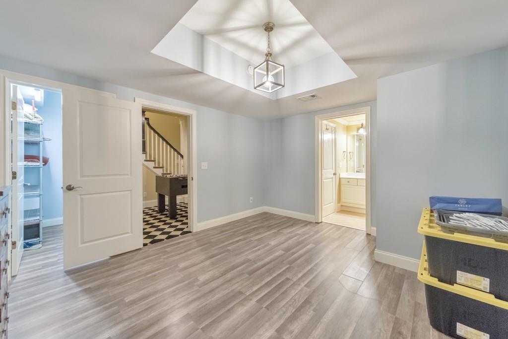 3901 Hazelhurst Drive Northeast Marietta, GA 30066 - Photo 49 of 79 wooden floor in an empty room with a window