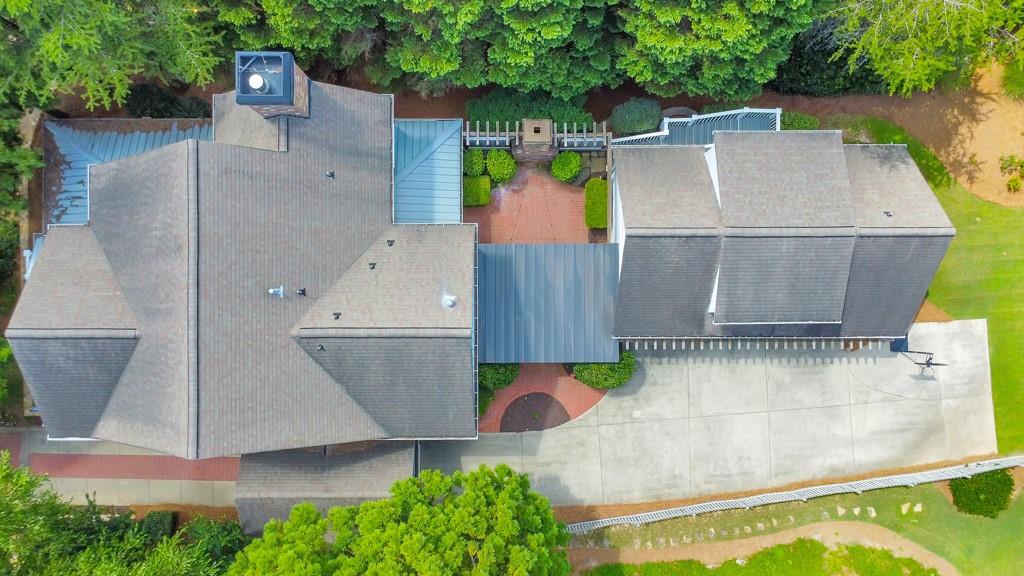 3901 Hazelhurst Drive Northeast Marietta, GA 30066 - Photo 71 of 79 an aerial view of a house with pool and a yard