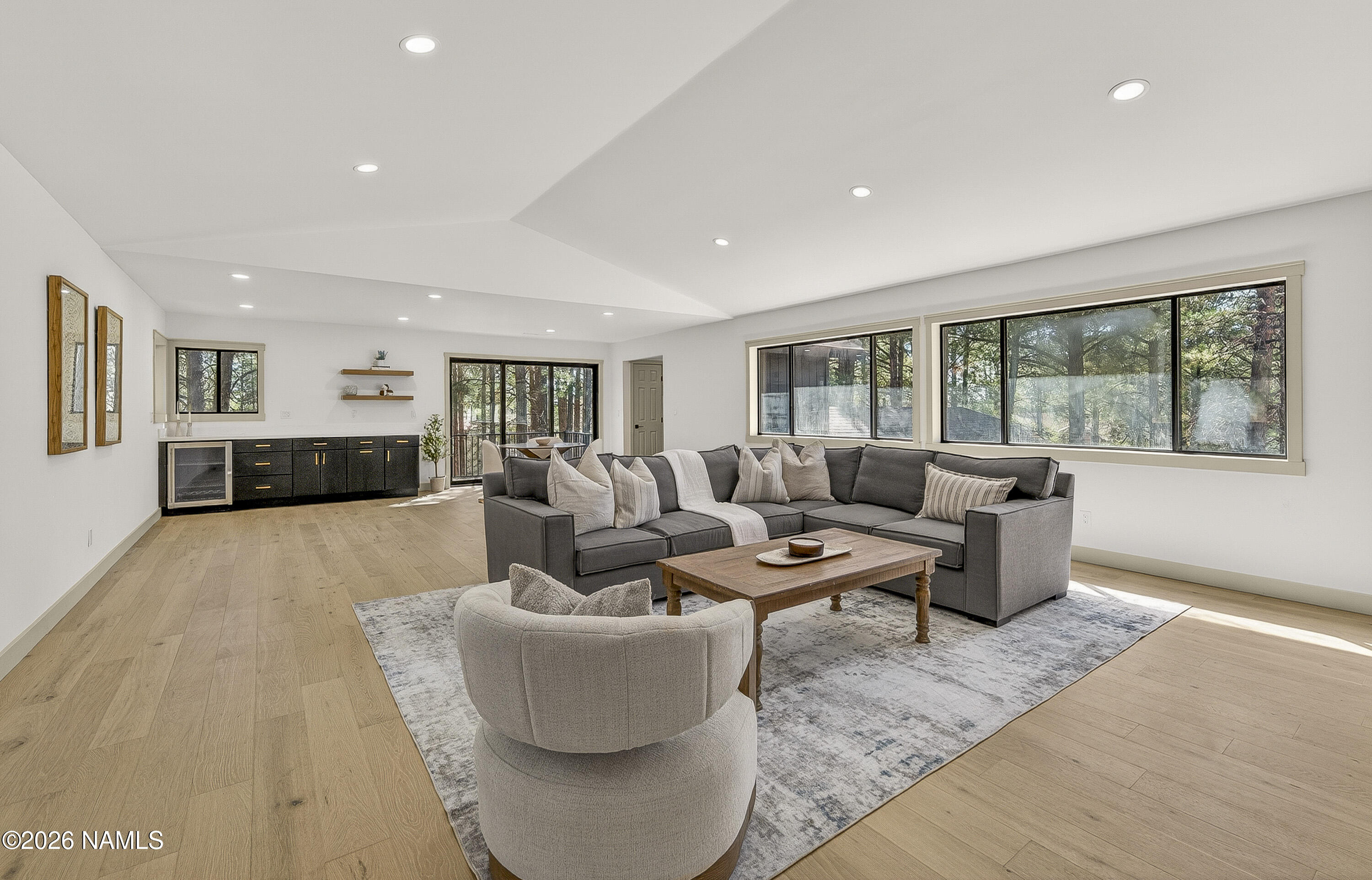 1411 Inverrary Way Flagstaff, AZ 86004 - Photo 37 of 49 a living room with furniture and a large window