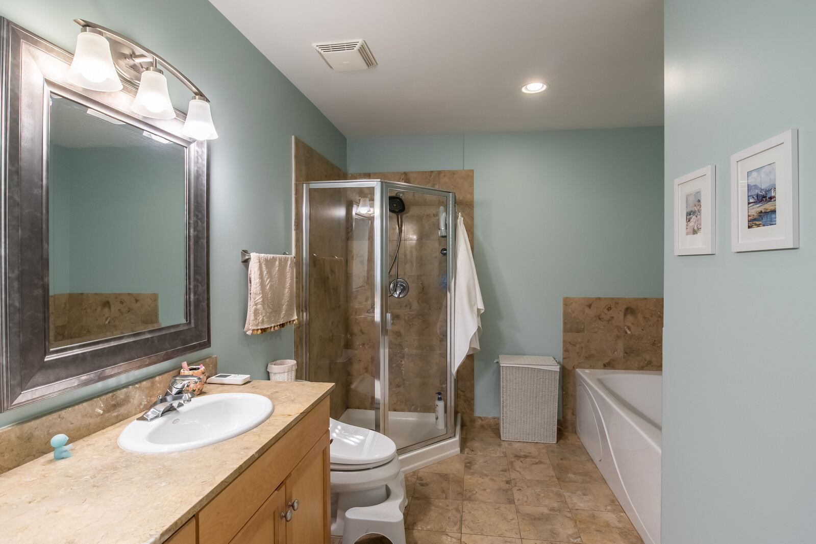 3755 North Racine Avenue, Unit 4E Chicago, IL 60613 - Photo 18 of 29 a bathroom with a granite countertop sink toilet and shower