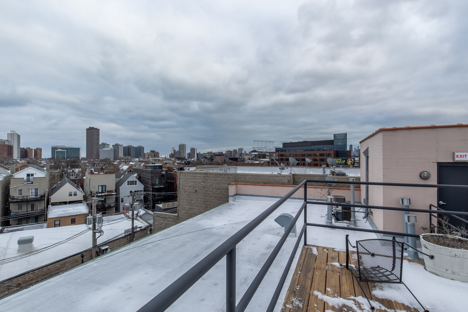3755 North Racine Avenue, Unit 4E Chicago, IL 60613 - Photo 25 of 29 a view of a balcony with two chairs