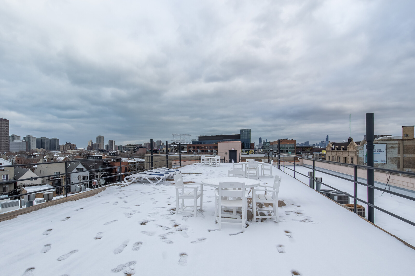 3755 North Racine Avenue, Unit 4E Chicago, IL 60613 - Photo 26 of 29 a view of a terrace with city view