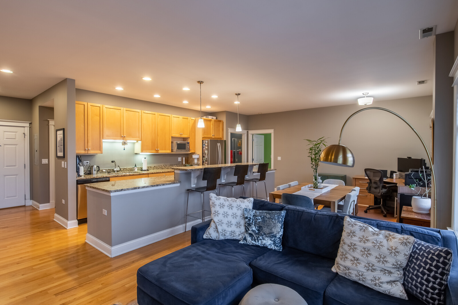 3755 North Racine Avenue, Unit 4E Chicago, IL 60613 - Photo 6 of 29 a living room with furniture and a wooden floor