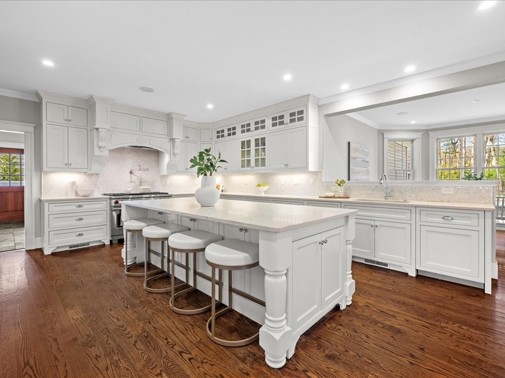 241 Bristol Road Wellesley, MA 02481 - Photo 15 of 42 a kitchen with a sink stove and cabinets