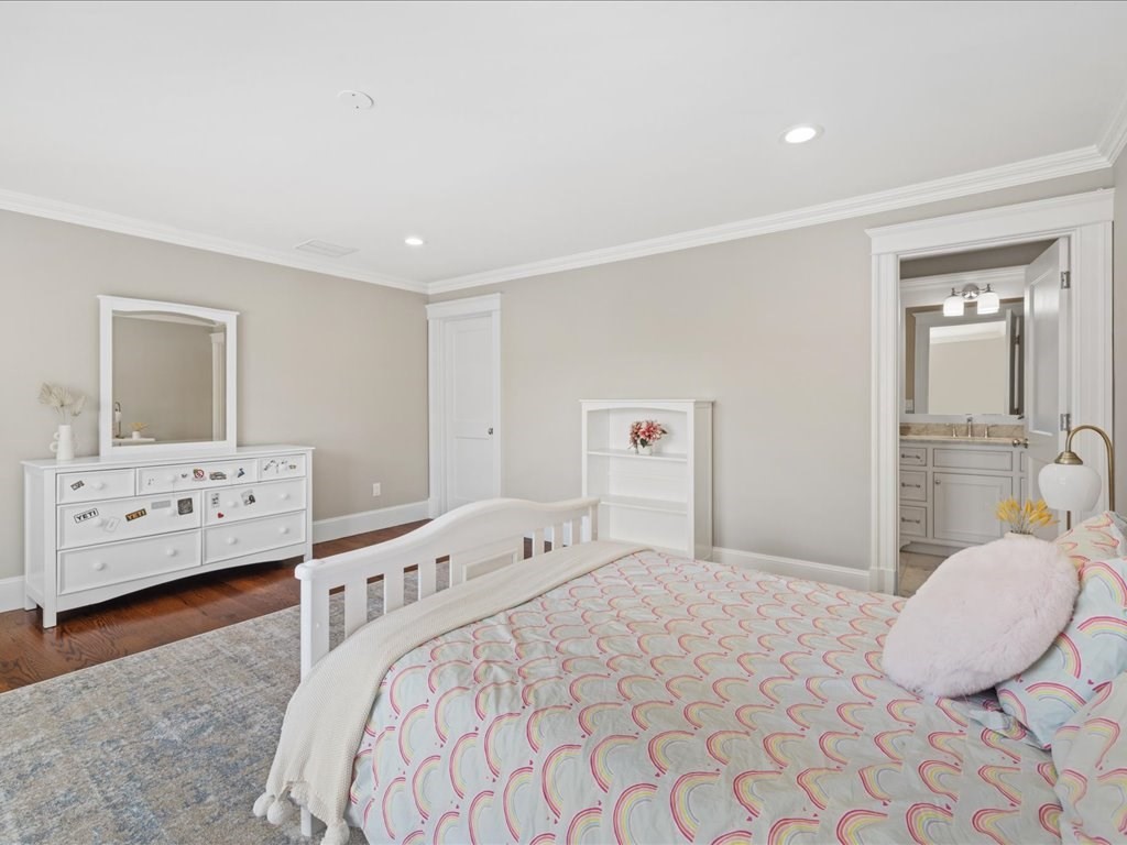 241 Bristol Road Wellesley, MA 02481 - Photo 21 of 42 a bedroom with a bed and a couch