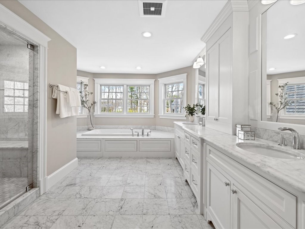 241 Bristol Road Wellesley, MA 02481 - Photo 27 of 42 a large spacious bathroom with a tub sink shower and mirror
