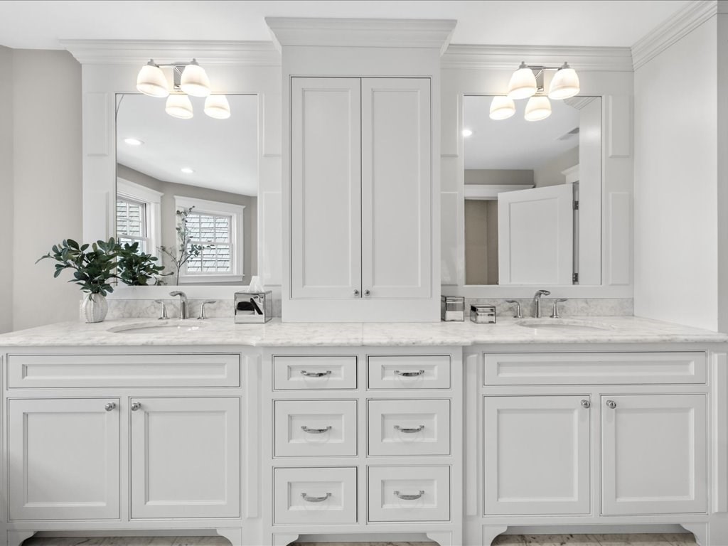 241 Bristol Road Wellesley, MA 02481 - Photo 28 of 42 a bathroom with white cabinets sink and mirror