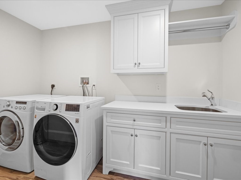 241 Bristol Road Wellesley, MA 02481 - Photo 31 of 42 a utility room with sink dryer and washer