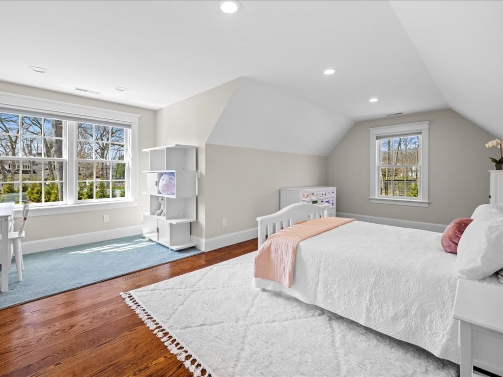 241 Bristol Road Wellesley, MA 02481 - Photo 32 of 42 a bedroom with a large bed and a window