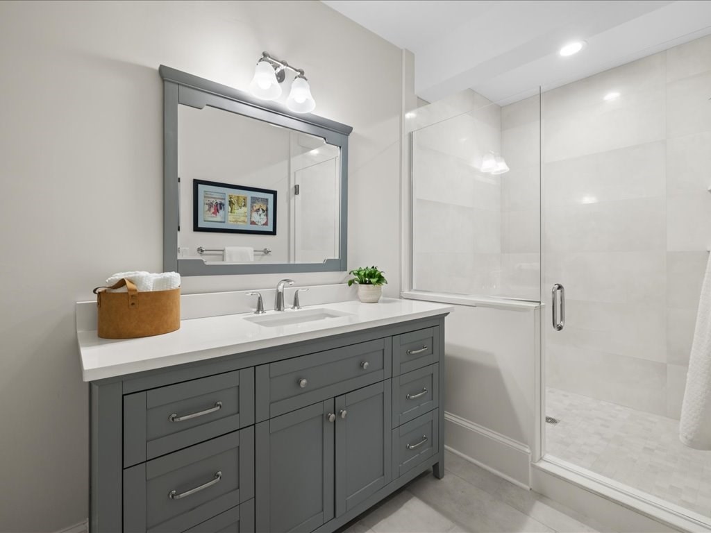 241 Bristol Road Wellesley, MA 02481 - Photo 38 of 42 a bathroom with a sink and a mirror