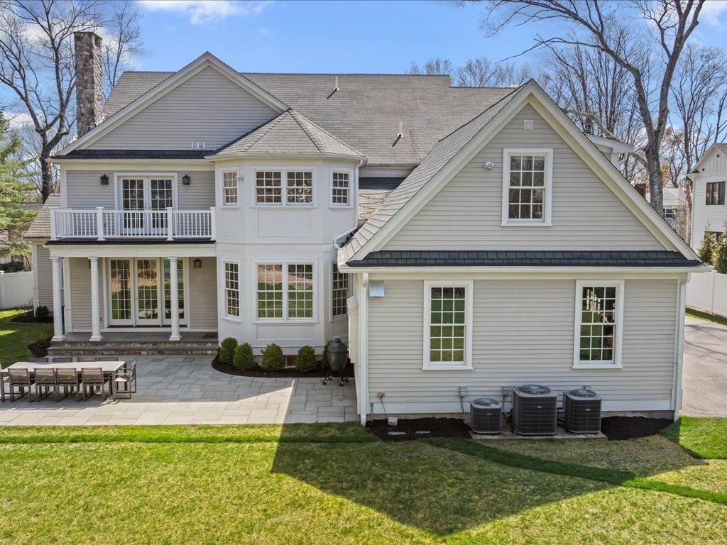 241 Bristol Road Wellesley, MA 02481 - Photo 39 of 42 a front view of a house with a yard