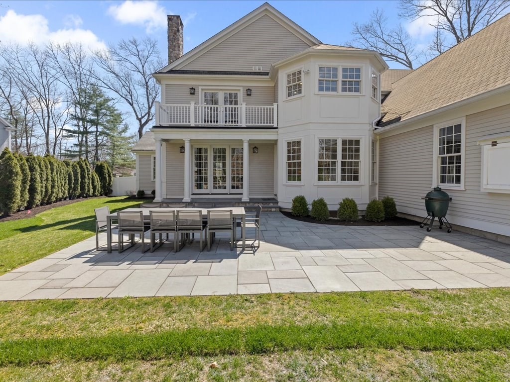 241 Bristol Road Wellesley, MA 02481 - Photo 40 of 42 a view of a house with a patio