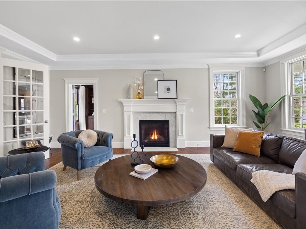 241 Bristol Road Wellesley, MA 02481 - Photo 7 of 42 a living room with furniture and a fireplace