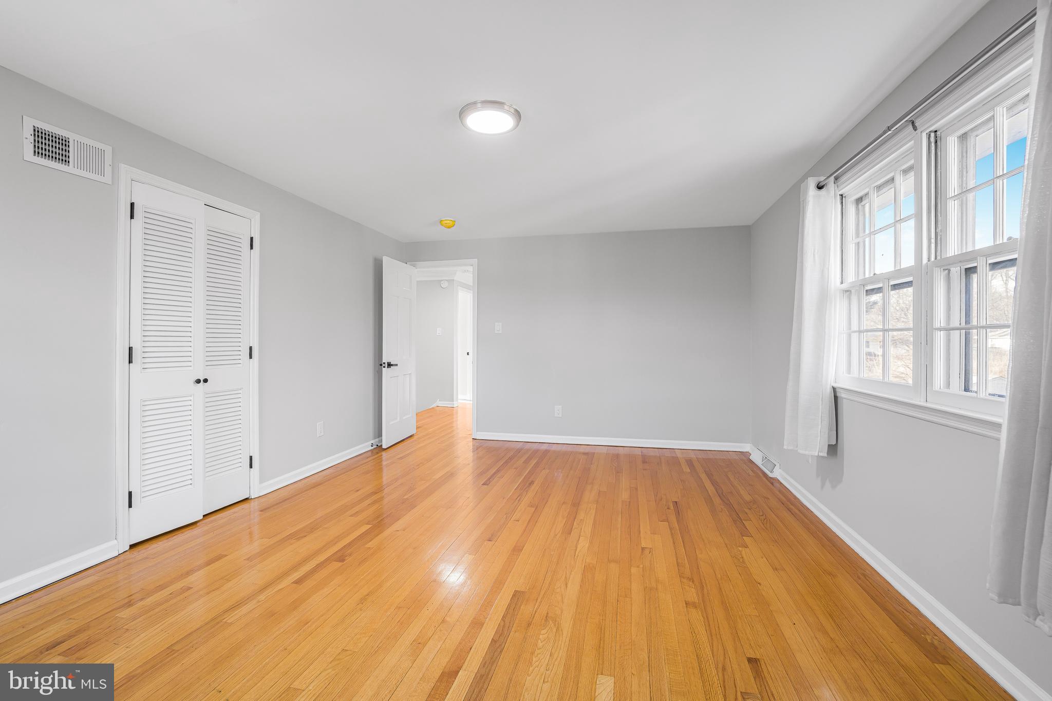 2205 Dorval Road Wilmington, DE 19810 - Photo 14 of 45 a view of empty room with wooden floor and fan
