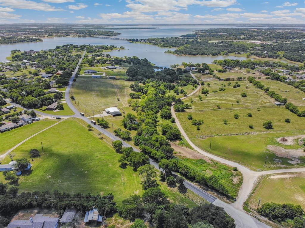 891 Shahan Prairie Road Little Elm, TX 75068 - Photo 3 of 21 a view of a lake with a mountain