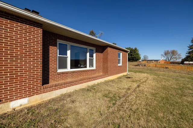 a view of street with house in background