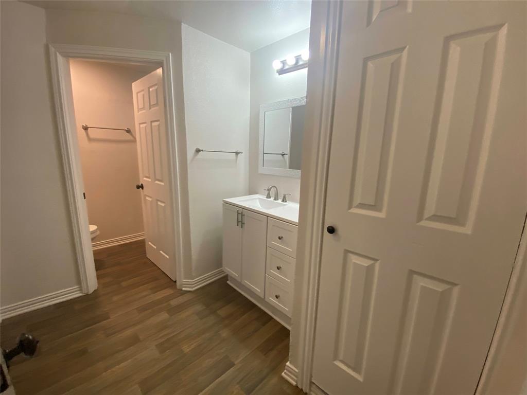 810 Greenville Road McKinney, TX 75069 - Photo 15 of 21 a bathroom with a sink a mirror and a shower