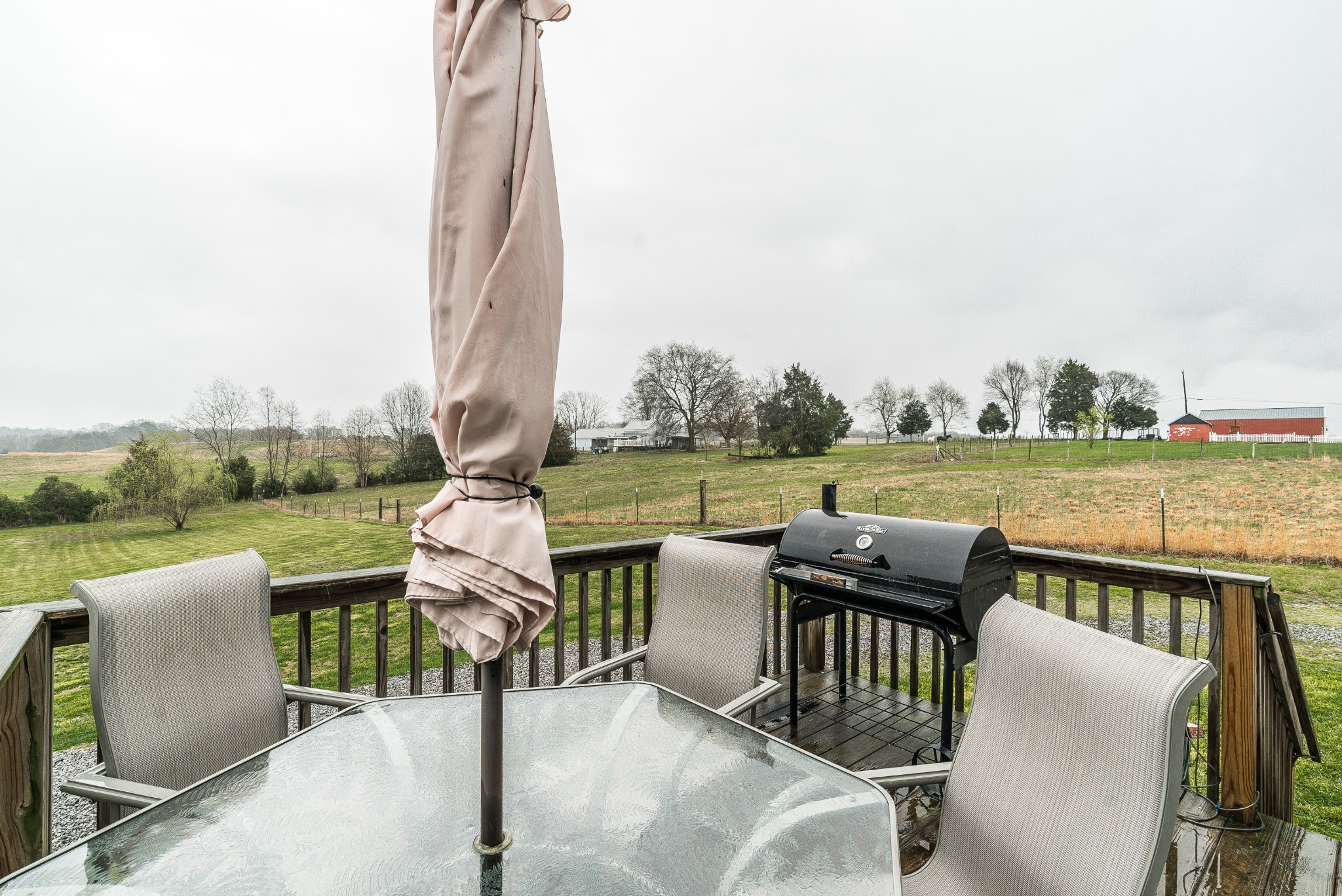 612 Denning Ford Road Portland, TN 37148 - Photo 16 of 26 a view of a patio with chairs and a table