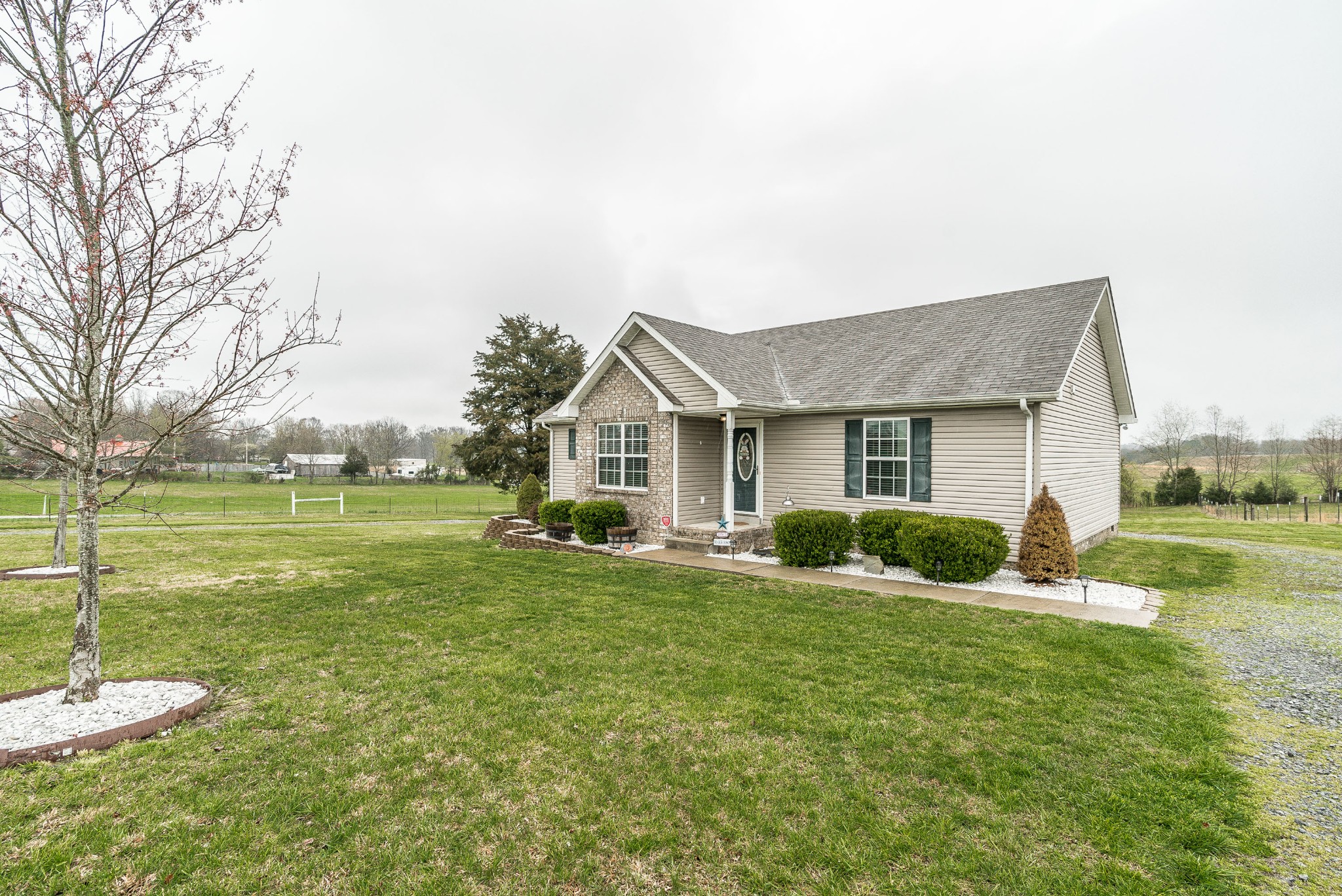 612 Denning Ford Road Portland, TN 37148 - Photo 24 of 26 a front view of house with yard and green space