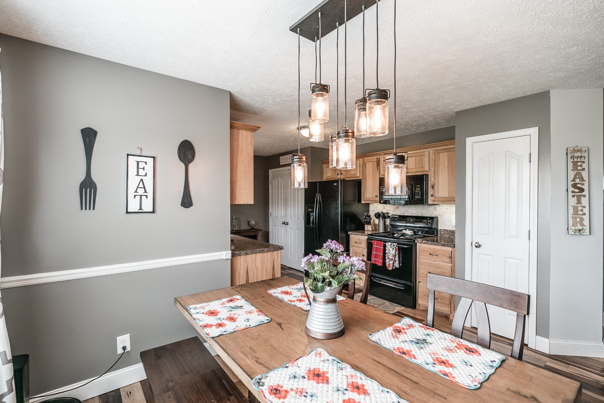 612 Denning Ford Road Portland, TN 37148 - Photo 6 of 26 a view of a dining room with furniture and a chandelier