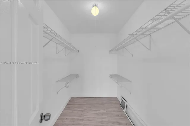 a view of a room with racks on the wall