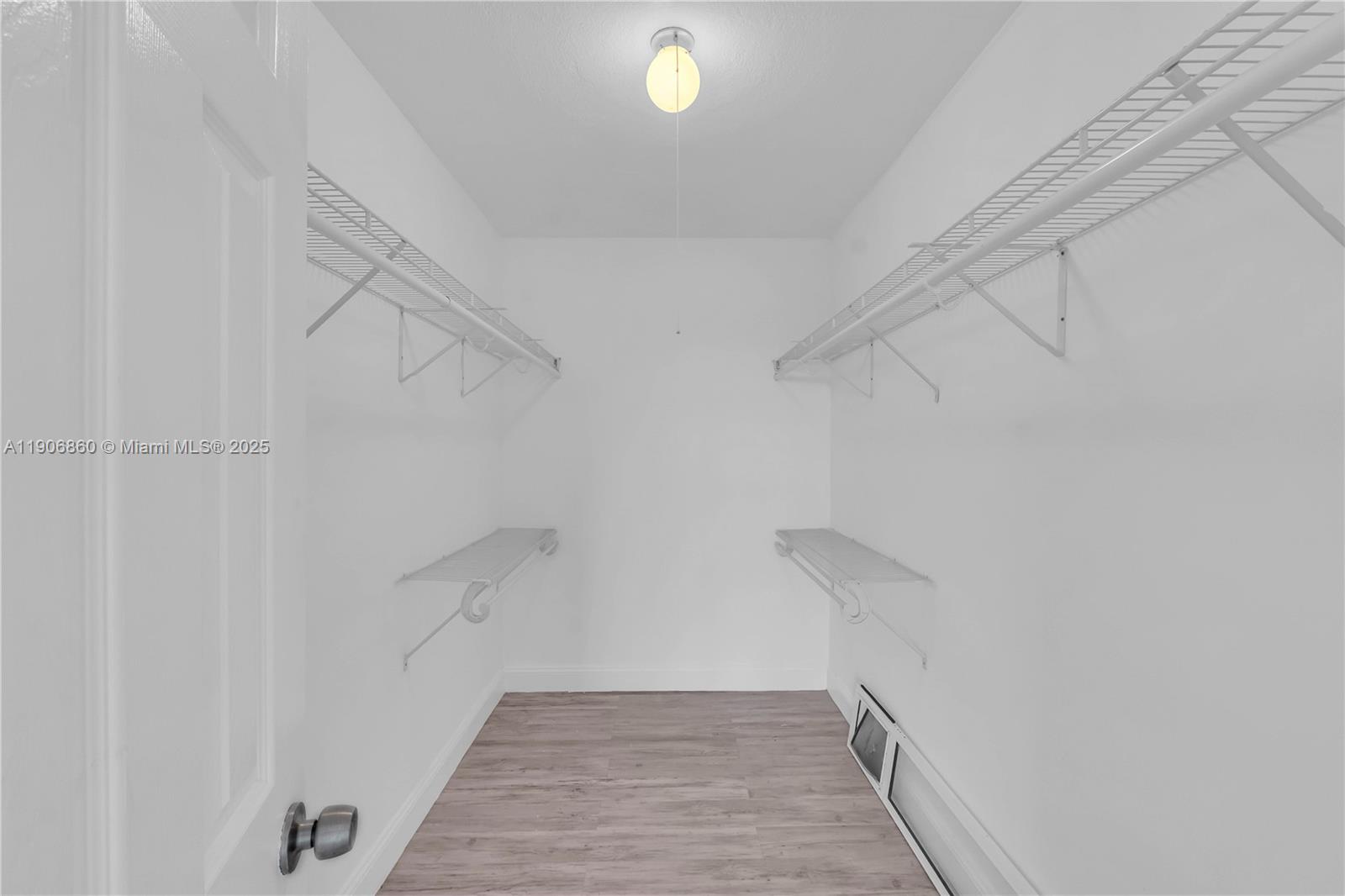 4164 Inverrary Drive, Unit 801 Lauderhill, FL 33319 - Photo 15 of 20 a view of a room with racks on the wall