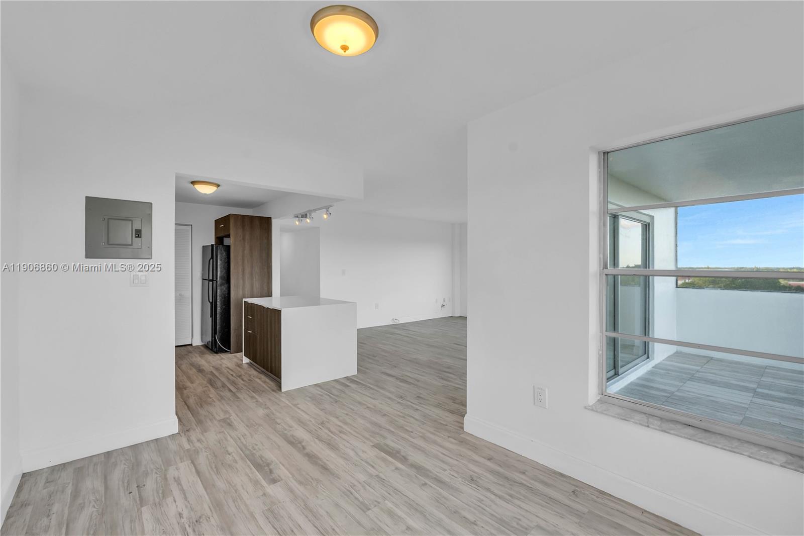 4164 Inverrary Drive, Unit 801 Lauderhill, FL 33319 - Photo 6 of 20 a view of a kitchen cabinets and wooden floor