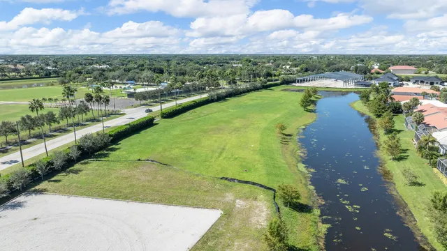 a view of a lake with a yard