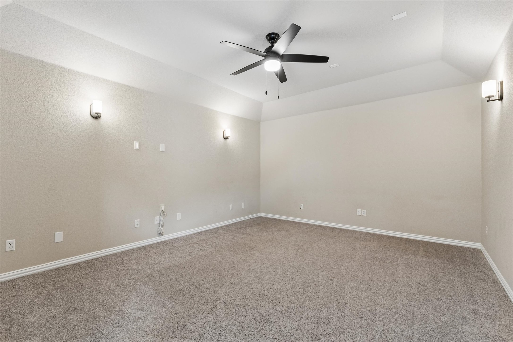 324 Autumn Oak Way Georgetown, TX 78628 - Photo 26 of 40 Spacious room featuring vaulted ceilings and neutral-toned carpeting
