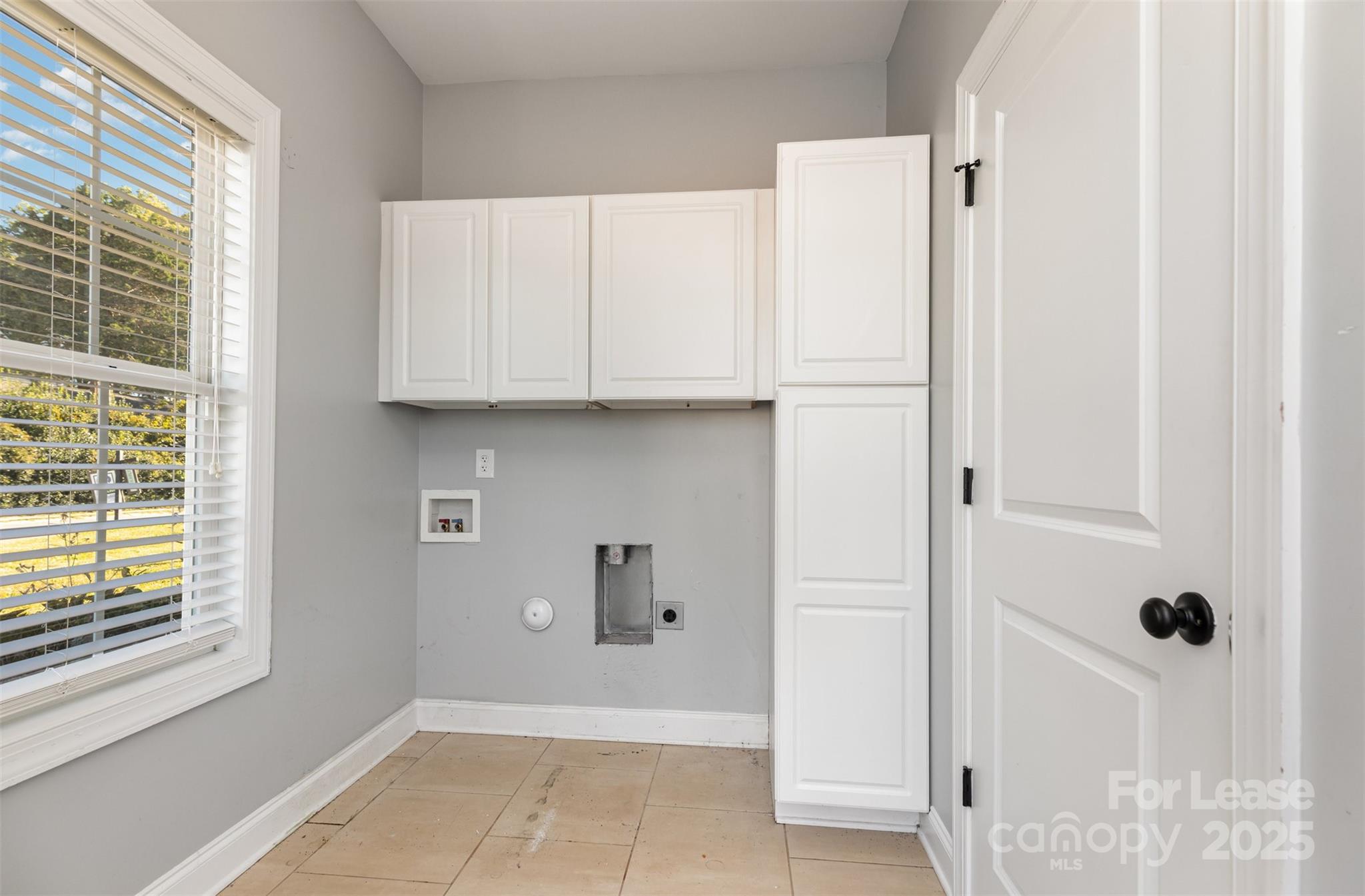 540 Greystone Road Charlotte, NC 28209 - Photo 16 of 18 a view of an empty room with a window