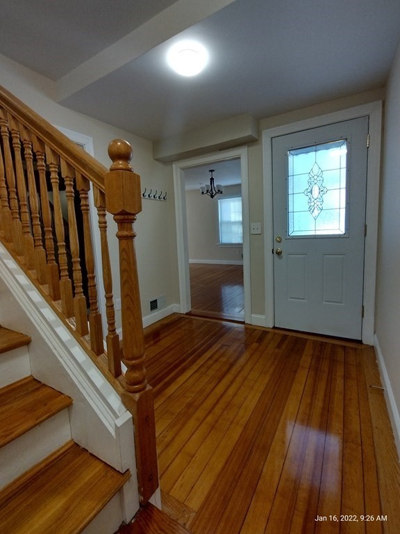 62 Washington Street, Unit 62 Wellesley, MA 02481 - Photo 7 of 18 a view of an entryway with wooden floor