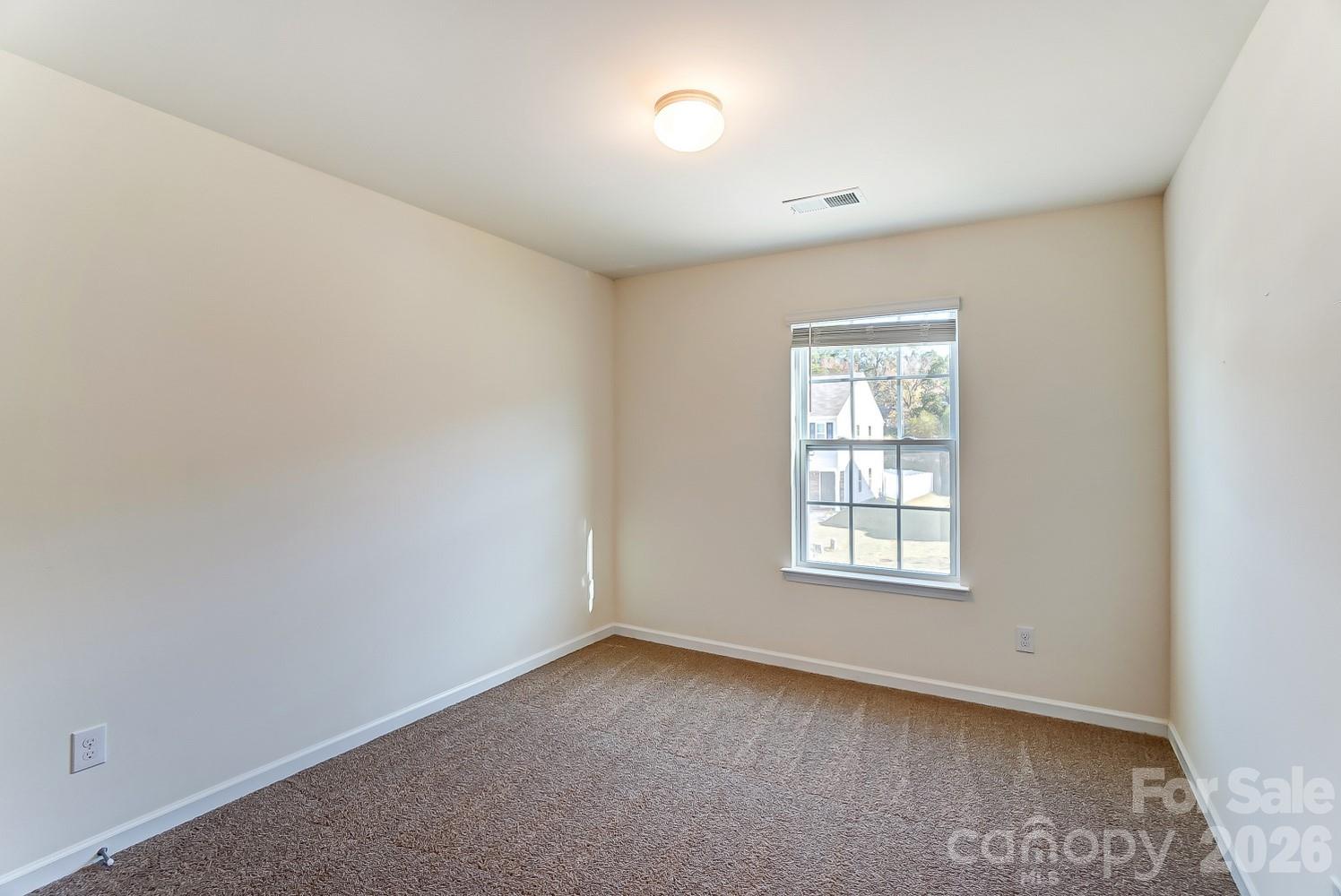 618 Bloomover Street Concord, NC 28025 - Photo 33 of 45 an empty room with a window