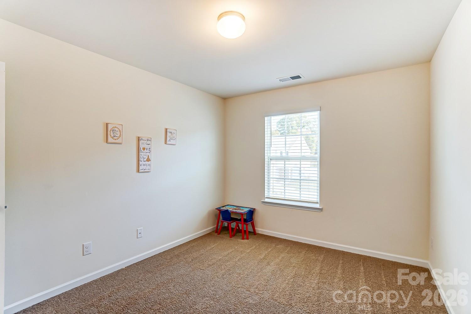 618 Bloomover Street Concord, NC 28025 - Photo 38 of 45 an empty room with windows