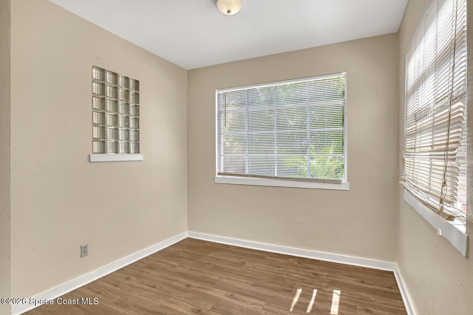 658 Young Street Melbourne, FL 32935 - Photo 24 of 77 a view of an empty room with a window