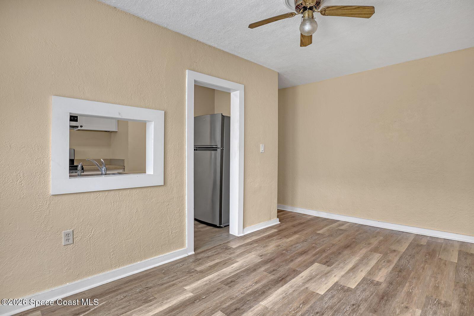 658 Young Street Melbourne, FL 32935 - Photo 27 of 77 a view of an empty room with a window