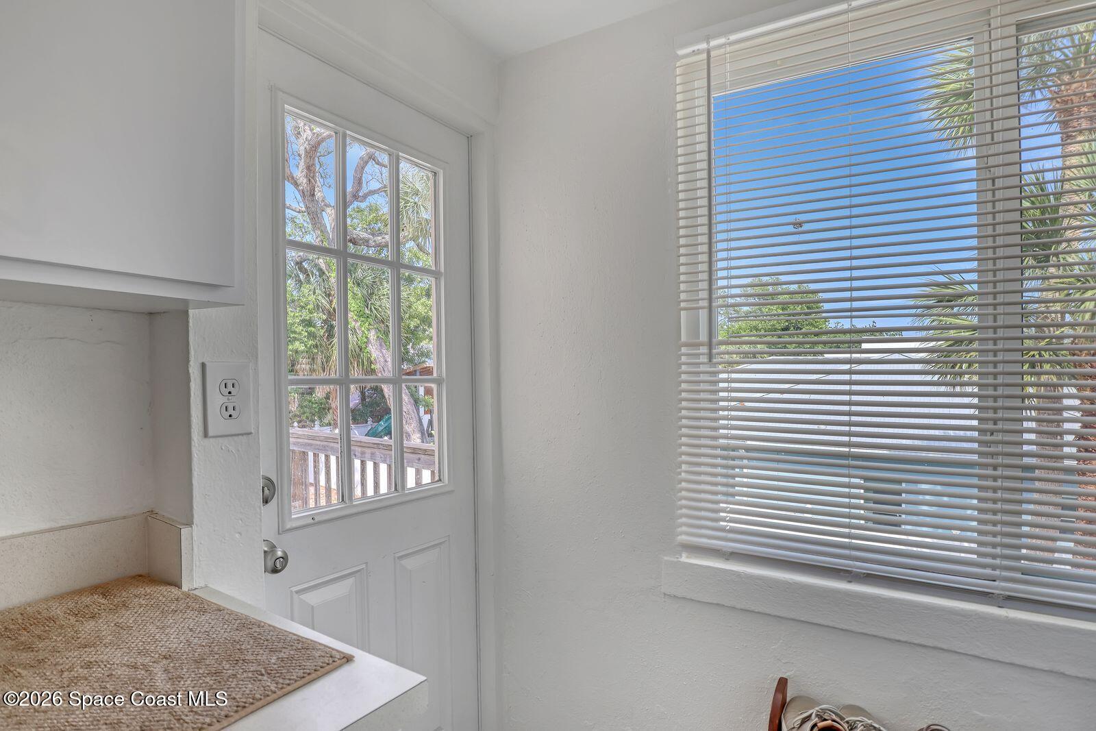 658 Young Street Melbourne, FL 32935 - Photo 46 of 77 a view of an empty room and window