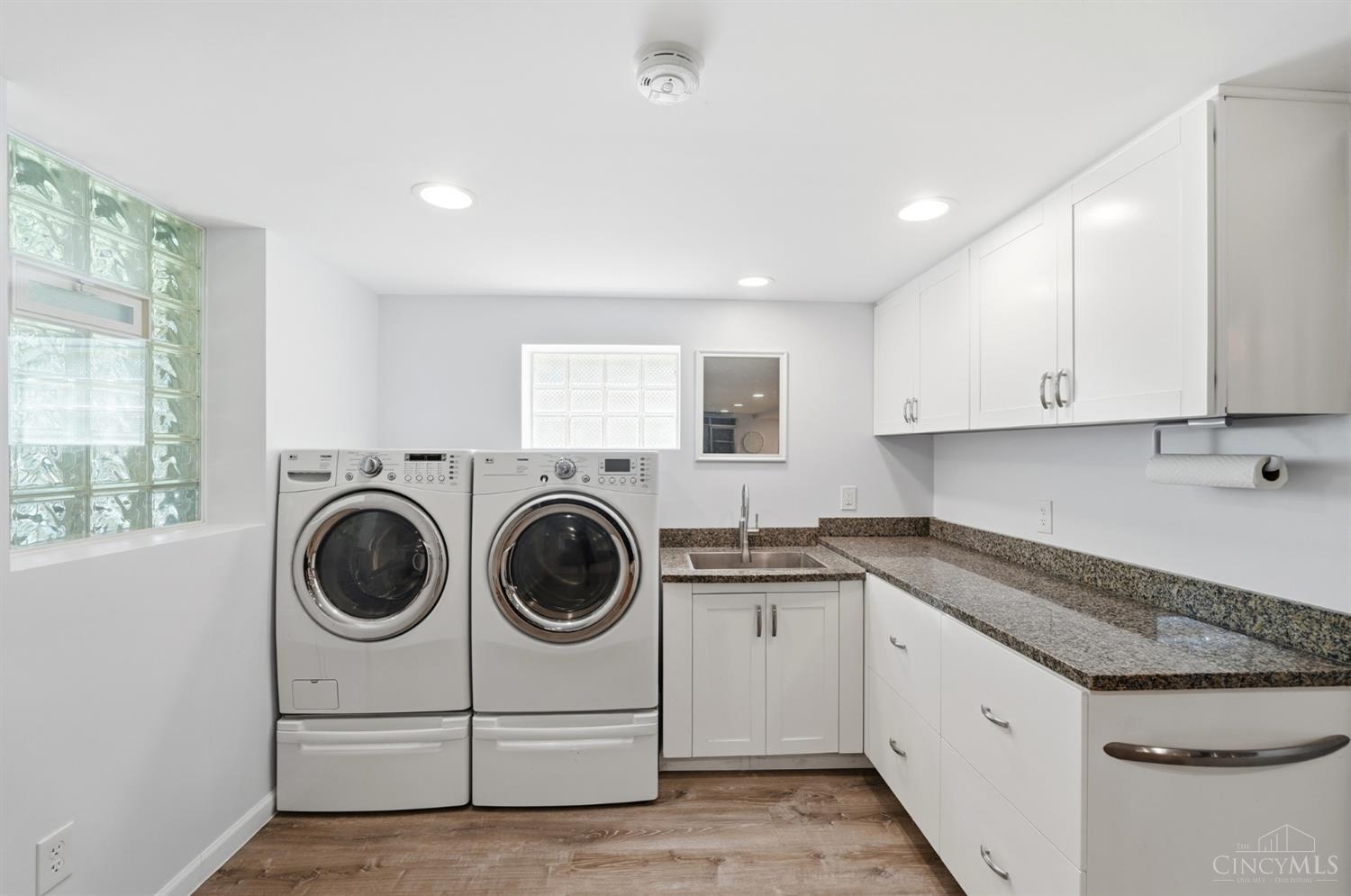 2853 Werk Road Cincinnati, OH 45211 - Photo 44 of 62 Laundry Area with stylish utility sink & ample storage. Washer & Dryer do not convey