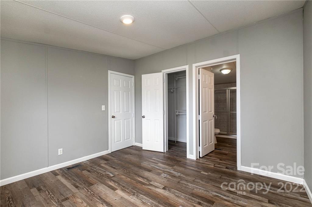3808 Belk Mill Road Wingate, NC 28174 - Photo 6 of 18 wooden floor in an empty room