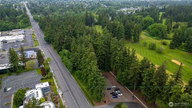 an aerial view of residential house with outdoor space